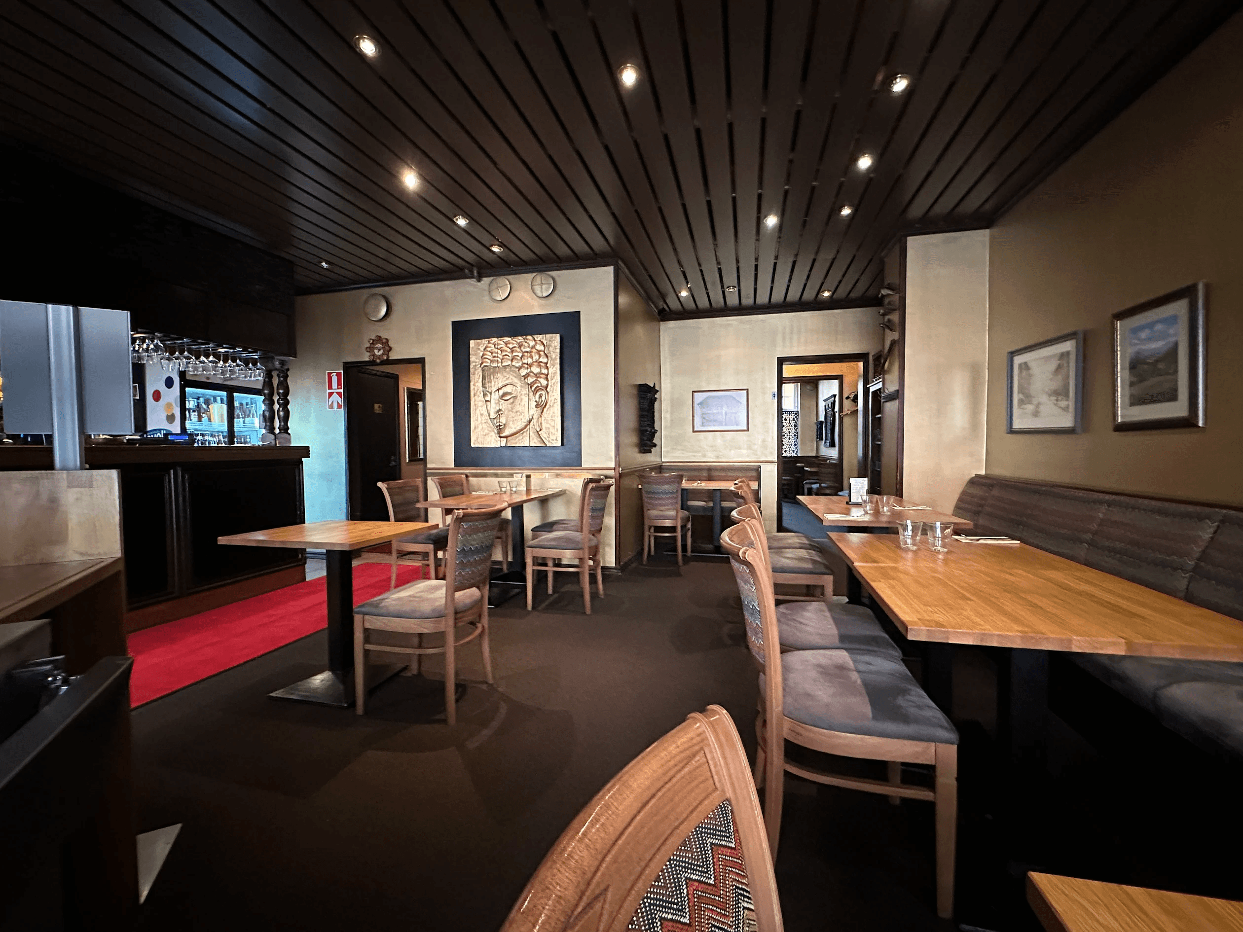 Chef preparing Nepali cuisine at Everest Ravintola kitchen